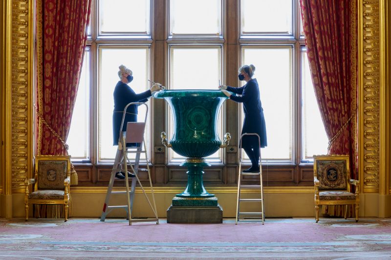 Staff dust the 1.8-metre-high Malachite Urn in Windsor Castle’s Grand Reception Room